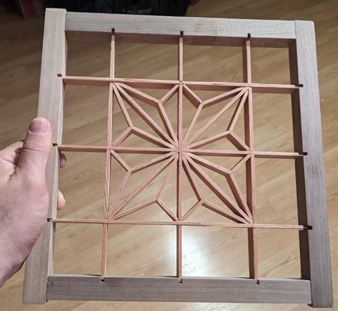 Kumiko geometric lattice study showing repeating wooden pattern units