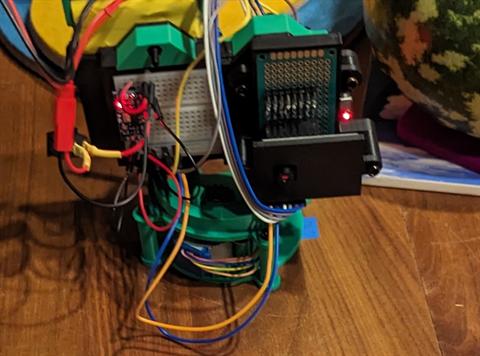 Turret concept study showing mechanical tracking head and base assembly