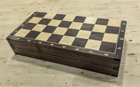 Walnut and maple folding chessboard open to show the playing surface